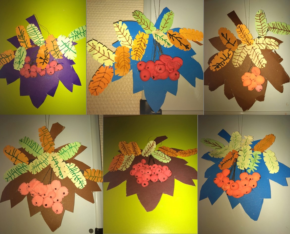 ГРОЗДЬ РЯБИНЫ НА ЛИСТКЕ КЛЕНОВОМ